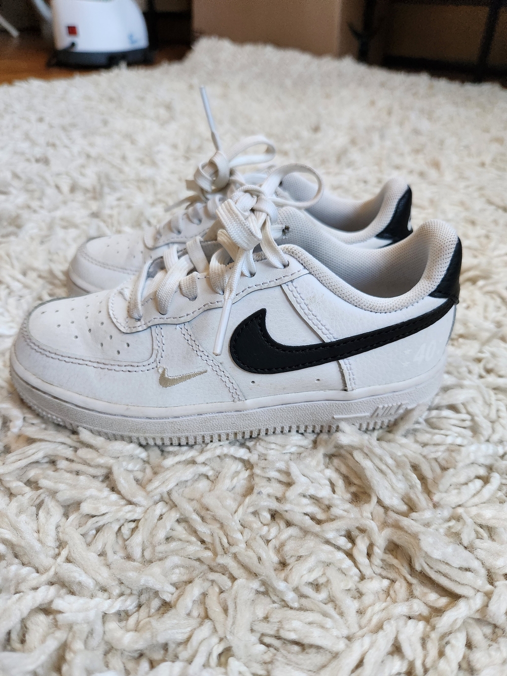 Nike Air Force 1 White Leather Sneakers with Black Swoosh